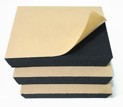 Insulated board with adhesive backing